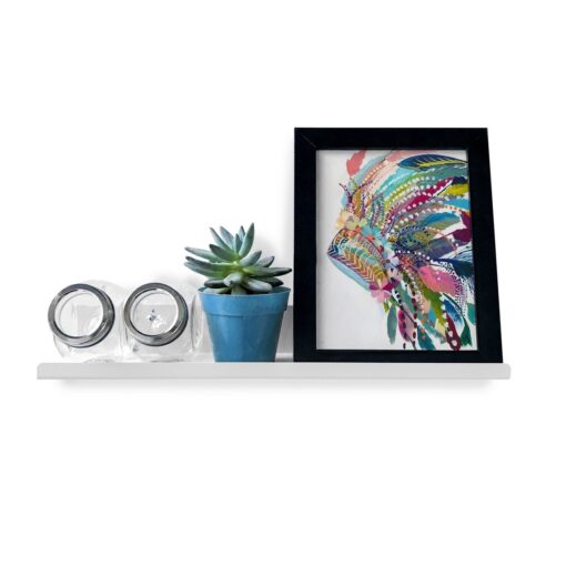 Estante LINE de 40cm en acero plegado, diseño moderno y minimalista, color blanco, con frascos, planta y cuadro decorativo Muett