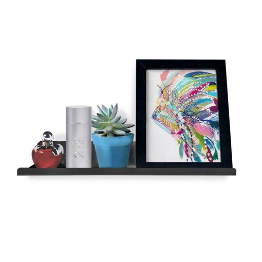 Estante LINE de 40cm en acero plegado, diseño moderno y minimalista, color negro con botellas de perfume, planta y cuadro decorativo Muett