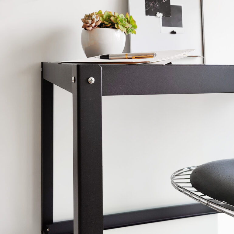 escritorio de acero metalico negro con ruedas diseño minimalista muett