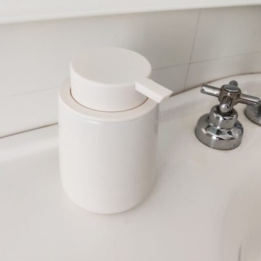 dispenser racionador de jabon de diseño para baño accesorio organizador minimalista Muett