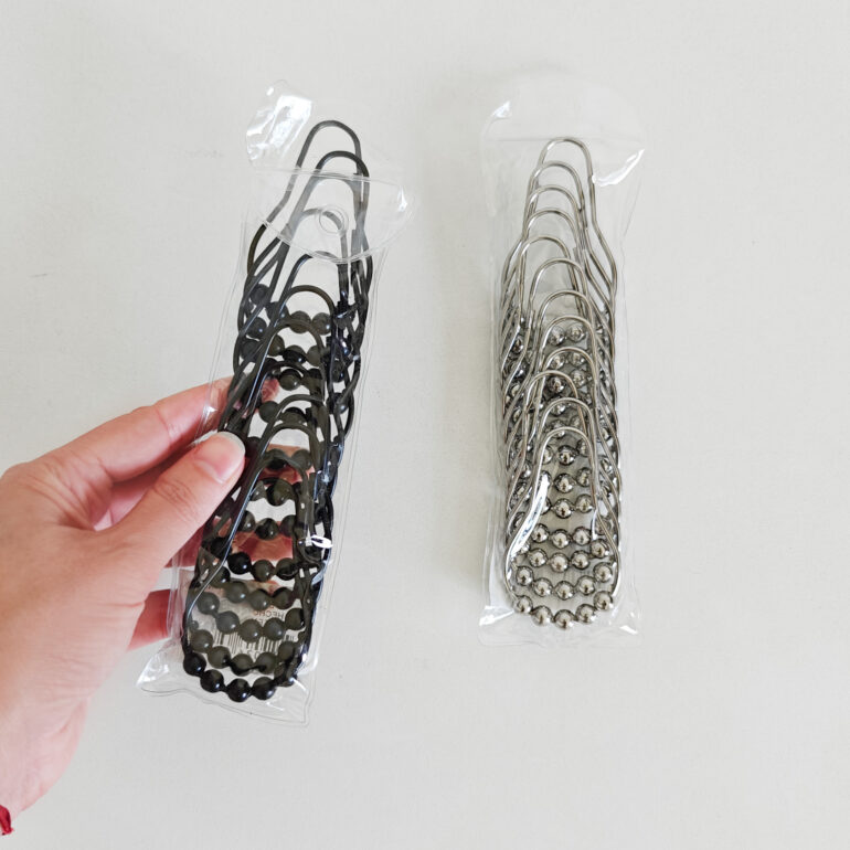 ganchos anillos para cortina de baño con bolitas rodamientos deslizantes de barral. diseño Muett